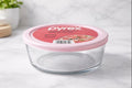 Pyrex Simply Store Tinted Glass 7-Cup Round Storage Container with Lid – Pink